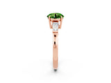 Rose gold Round Cut Cut Diamond Ring with Tapered Baguette Side Stones in Four-Prong Setting_2