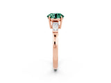 Rose gold Round Cut Cut Diamond Ring with Tapered Baguette Side Stones in Four-Prong Setting_2