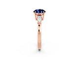 Rose gold Round Cut Cut Diamond Ring with Tapered Baguette Side Stones in Four-Prong Setting_2