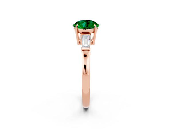 Rose gold Round Cut Emerald Three-Stone Ring with Tapered Baguette Side Stones and Prong Setting