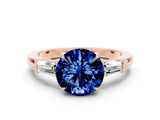 Rose gold Round Cut Cut Diamond Ring with Tapered Baguette Side Stones in Four-Prong Setting