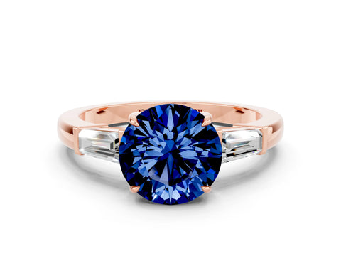 Rose gold Round Cut Cut Diamond Ring with Tapered Baguette Side Stones in Four-Prong Setting