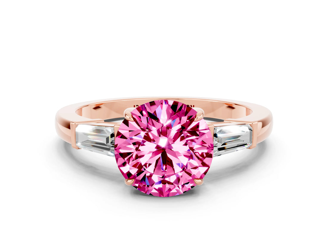 Rose gold Round Cut Cut Diamond Ring with Tapered Baguette Side Stones in Four-Prong Setting