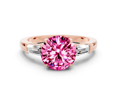 Rose gold Round Cut Cut Diamond Ring with Tapered Baguette Side Stones in Four-Prong Setting