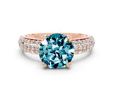 Rose gold Round Cut Cut Pave Diamond Engagement Ring with Channel Set Band and Four-Prong Setting