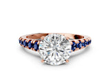 Rose gold Round Cut Diamond Cathedral Solitaire Ring with Round with Blue Sapphire side stone Pavé Band_12