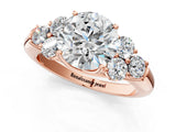 Rose gold Round Cut Diamond Cluster Ring with Round Accent Stones and Prong Setting on a Classic Band_63