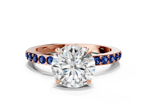 Rose gold Round Cut Diamond Pavé Engagement Ring with Round with Blue Sapphire side stone Accents and Prong Setting