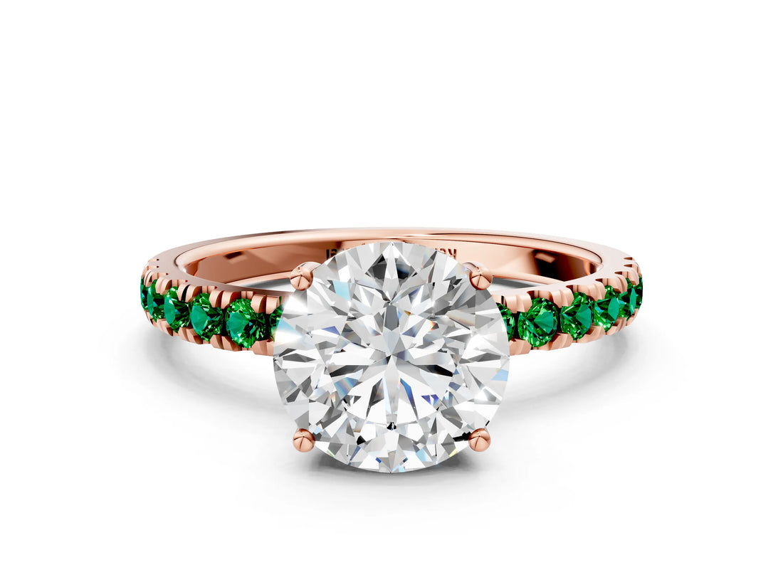 Rose gold Round Cut Diamond Pave Band Solitaire Ring with Round with Emerald side stone and Prong Setting