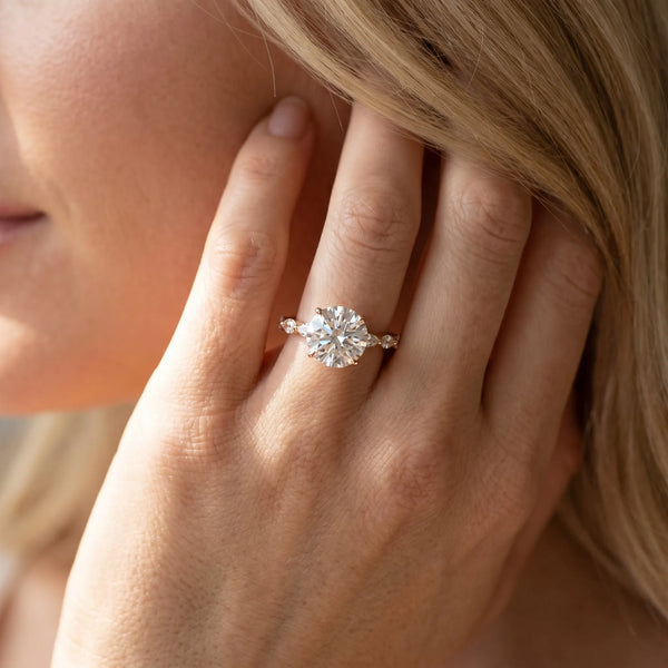 Rose gold Round Cut Diamond Ring with Marquise Side Stones and Prong Setting