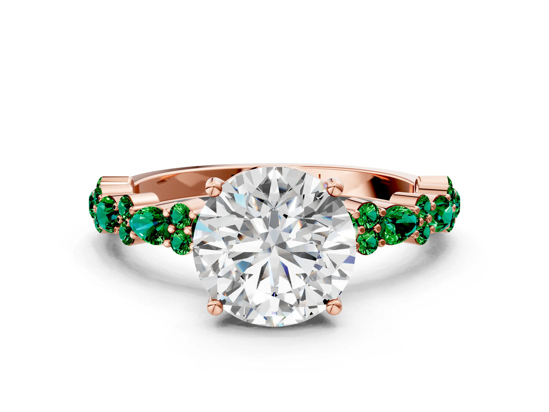 Rose gold Round Cut Diamond Side Stone Solitaire Ring with Round with Emerald side stone and Four-Prong Setting
