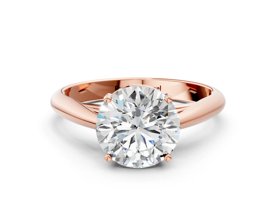 Rose gold Round Cut Diamond Solitaire Engagement Ring with Cathedral Setting and Four-Prong Mount