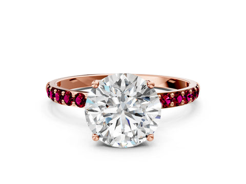 Rose gold Round Cut Diamond Solitaire Engagement Ring with Round with Garnet side stone Pavé Band and Prong Setting