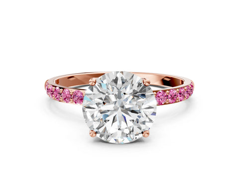 Rose gold Round Cut Diamond Solitaire Engagement Ring with Round with Pink Sapphire side stone Pavé Band and Prong Setting