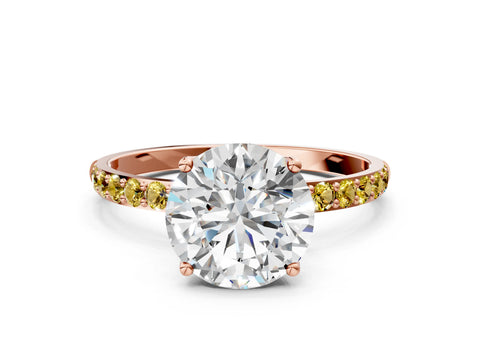 Rose gold Round Cut Diamond Solitaire Engagement Ring with Round with Yellow Sapphire side stone Pavé Band and Prong Setting