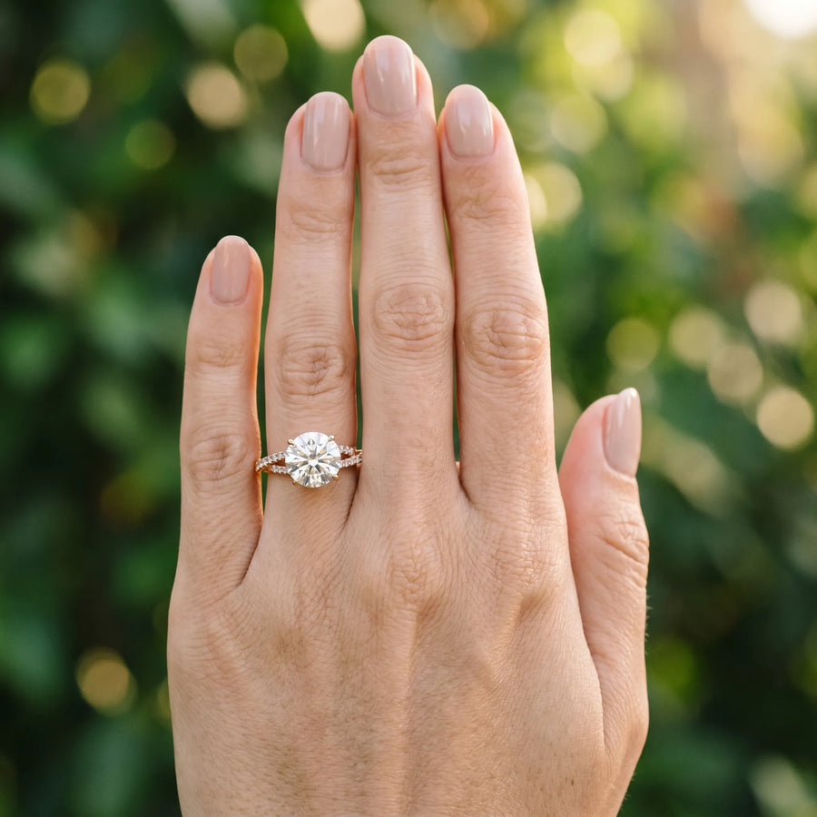 Rose gold Round Cut Diamond Solitaire Engagement Ring with Twisted Pavé Band and Four-Prong Setting