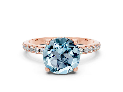 Rose gold Round Cut Diamond Solitaire Ring with Four-Prong Setting and Pavé Band
