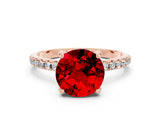 Rose gold Round Cut Diamond Solitaire Ring with Four-Prong Setting and Pavé Band