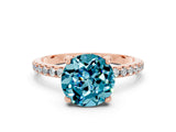 Rose gold Round Cut Diamond Solitaire Ring with Four-Prong Setting and Pavé Band
