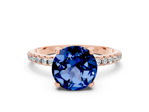 Rose gold Round Cut Diamond Solitaire Ring with Four-Prong Setting and Pavé Band