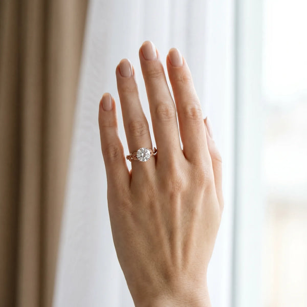 14K Rose Gold 1.55 Carat F VS1 Round Diamond Solitaire Ring with Leaf Motif Band and Four-Prong Setting