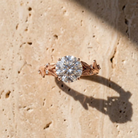 14K Rose Gold 1.55 Carat F VS1 Round Diamond Solitaire Ring with Leaf Motif Band and Four-Prong Setting