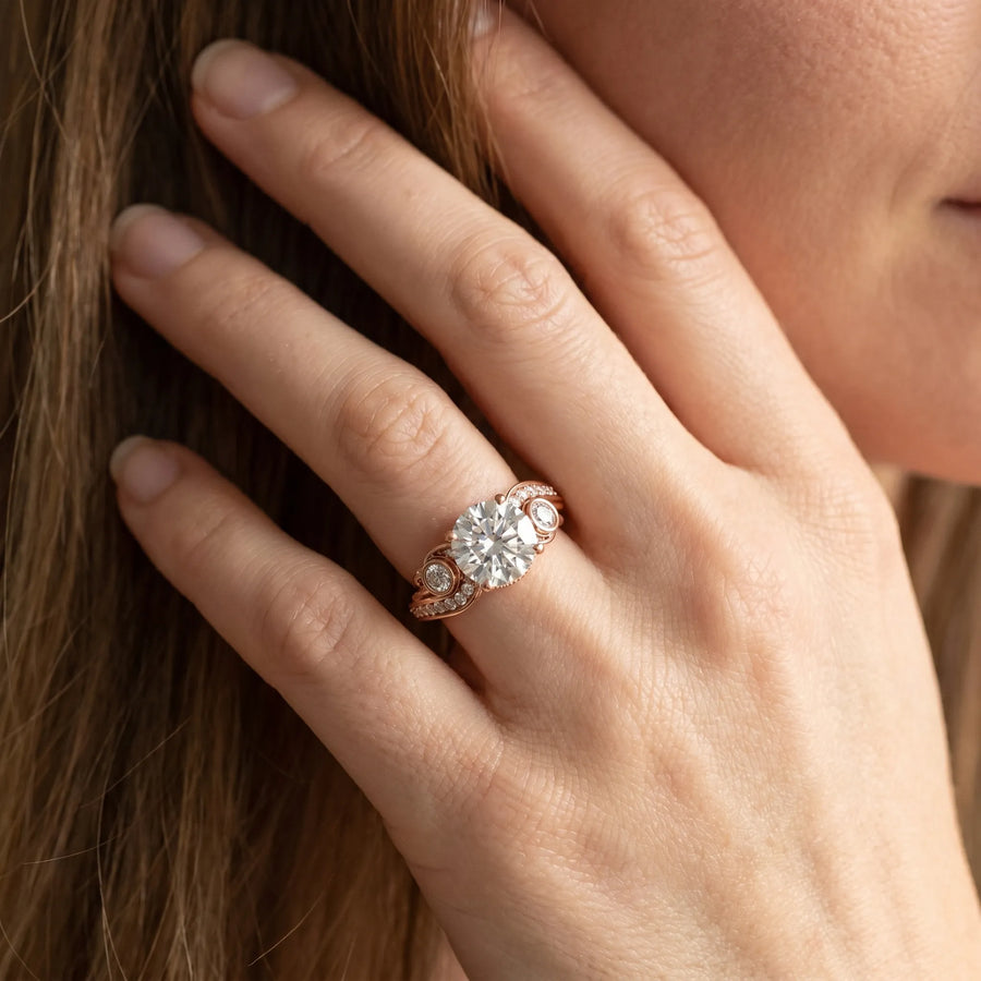 Rose gold Round Cut Diamond Solitaire Ring with Milgrain Pavé Band and Four-Prong Setting