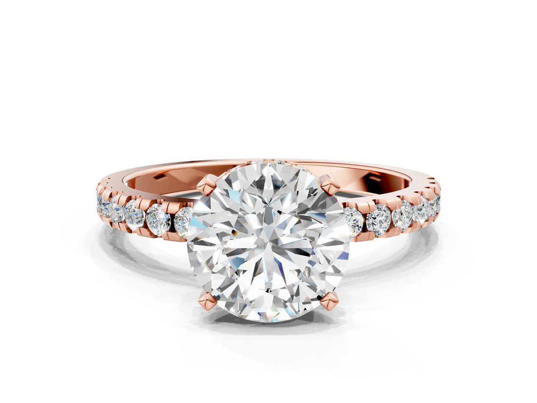 Rose gold Round Cut Diamond Solitaire Ring with Pavé Band and Four-Prong Setting