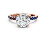 Rose gold Round Cut Diamond Solitaire Ring with Pavé Band and Four-Prong Setting