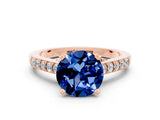 Rose gold Round Cut Diamond Solitaire Ring with Pavé Band and Prong Setting