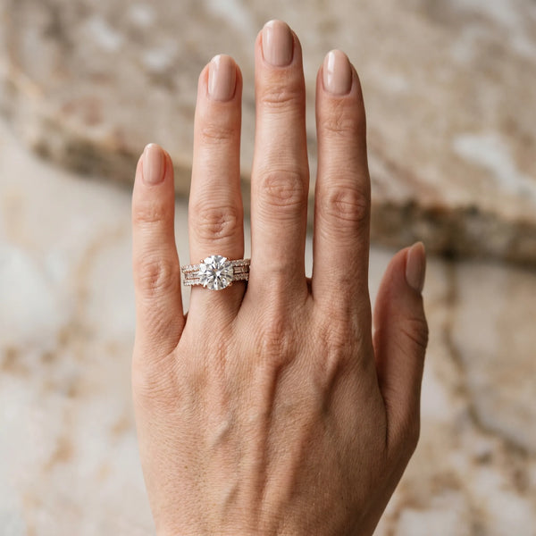 Rose gold Round Cut Diamond Solitaire Ring with Pavé and Channel Set Band