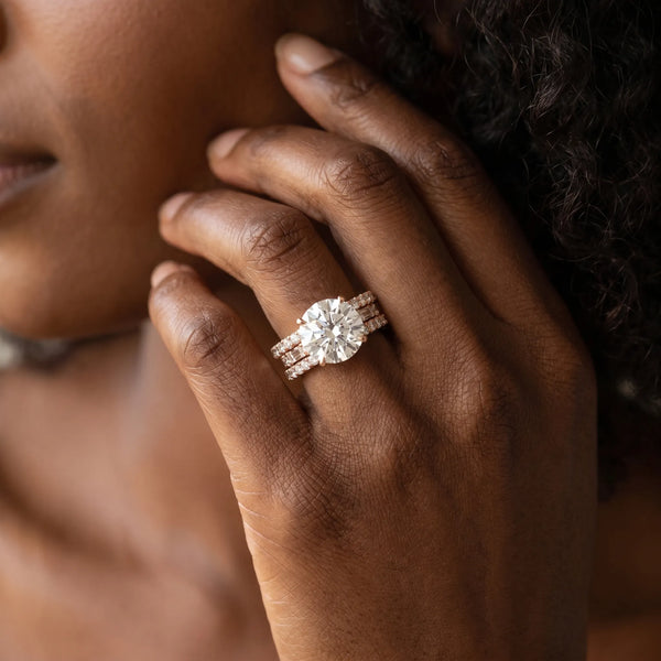 Rose gold Round Cut Diamond Solitaire Ring with Pavé and Channel Set Band