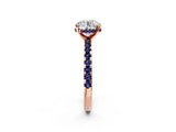 Rose gold Round Cut Diamond Solitaire Ring with Round with Blue Sapphire side stone Pavé Band and Four-Prong Setting_38