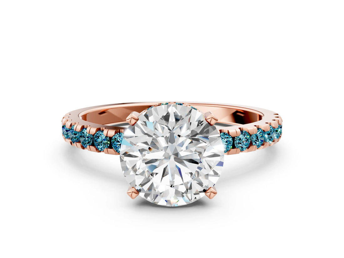 Rose gold Round Cut Diamond Solitaire Ring with Round with Blue Topaz side stone Pavé Band and Four-Prong Setting_36