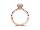 Rose gold Round Cut Diamond Solitaire Ring with Round with Blue Topaz side stone Pavé Band and Four-Prong Setting_39