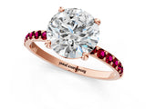 Rose gold Round Cut Diamond Solitaire Ring with Round with Garnet side stone Pavé Band and Prong Setting_25