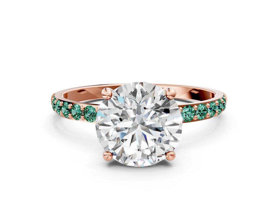 Rose gold Round Cut Diamond Solitaire Ring with Round with Green Sapphire side stone Pavé Band and Prong Setting
