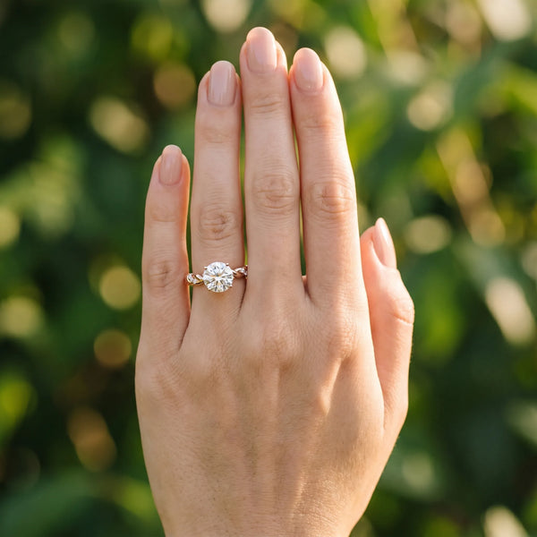 Rose gold Round Cut Diamond Solitaire Ring with Twisted Band and Pavé Accents