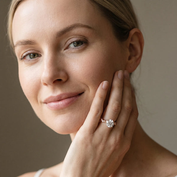 Rose gold Round Cut Diamond Solitaire Ring with Twisted Band and Pavé Accents