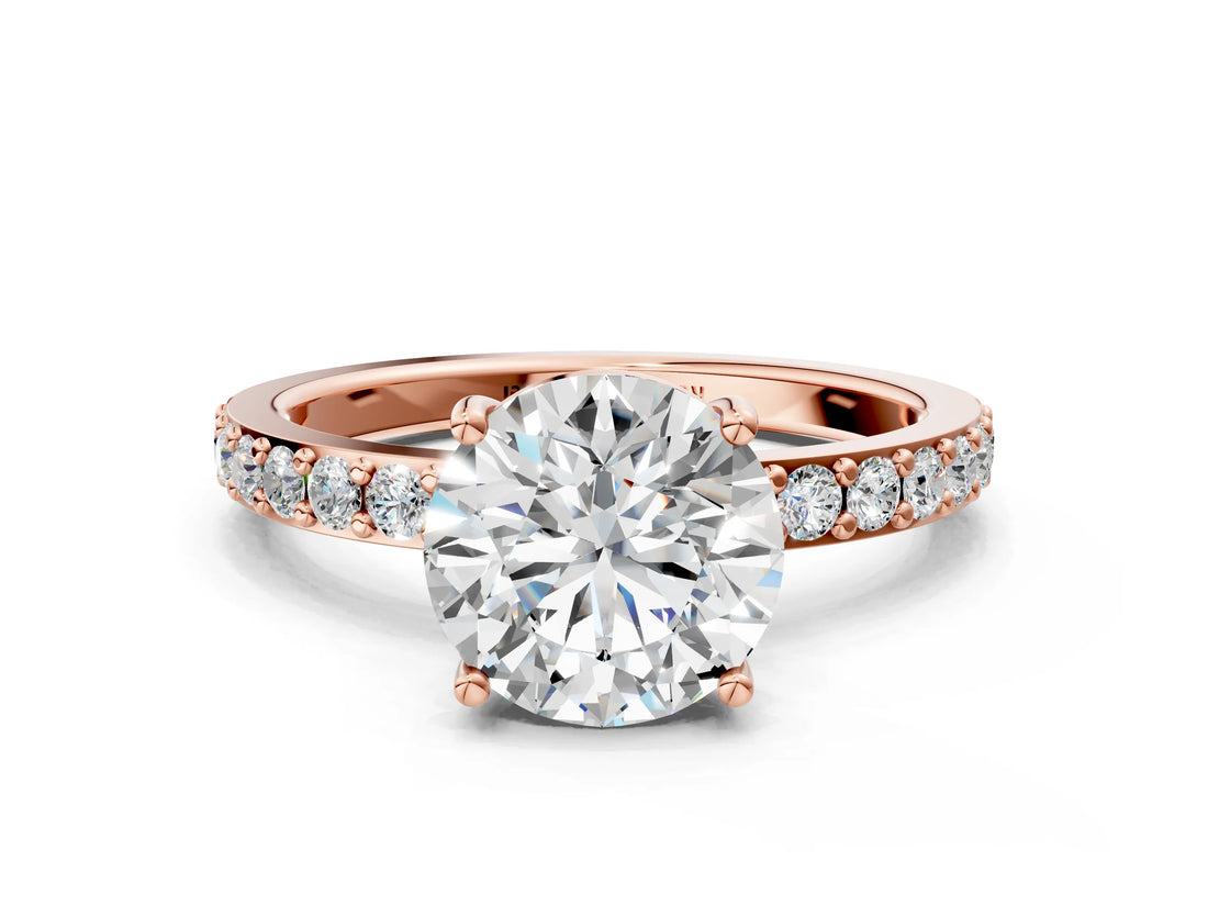 Rose gold Round Cut Diamond Solitaire with Pave Band and Four-Prong Setting