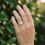 Rose gold Round Cut Diamond Three-Stone Ring with Channel Set Band and Four-Prong Setting_81