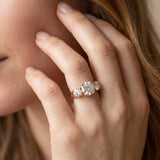 Rose gold Round Cut Diamond Three-Stone Ring with Channel Set Band and Four-Prong Setting_83