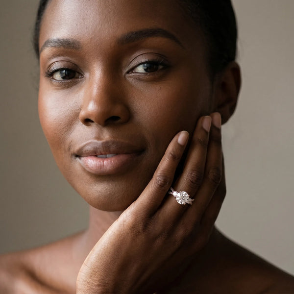 Rose gold Round Cut Diamond Three-Stone Ring with Pavé Split Shank and Four-Prong Setting