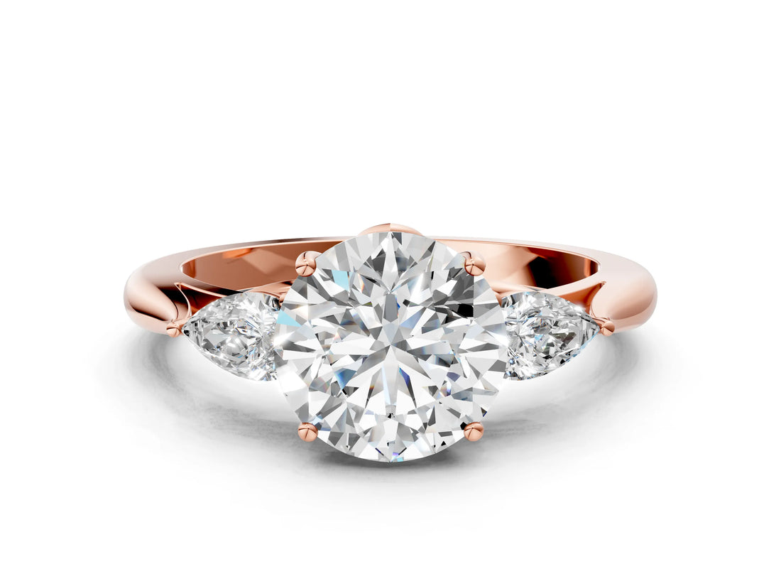Rose gold Round Cut Diamond Three-Stone Ring with Pear Side Stones and Four-Prong Setting_72