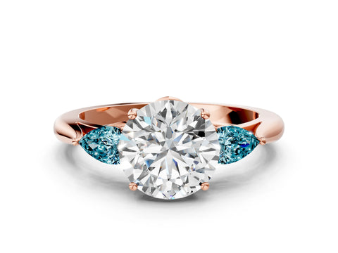 Rose gold Round Cut Diamond Three-Stone Ring with Pear with Blue Topaz side stone Side Stones and Prong Setting
