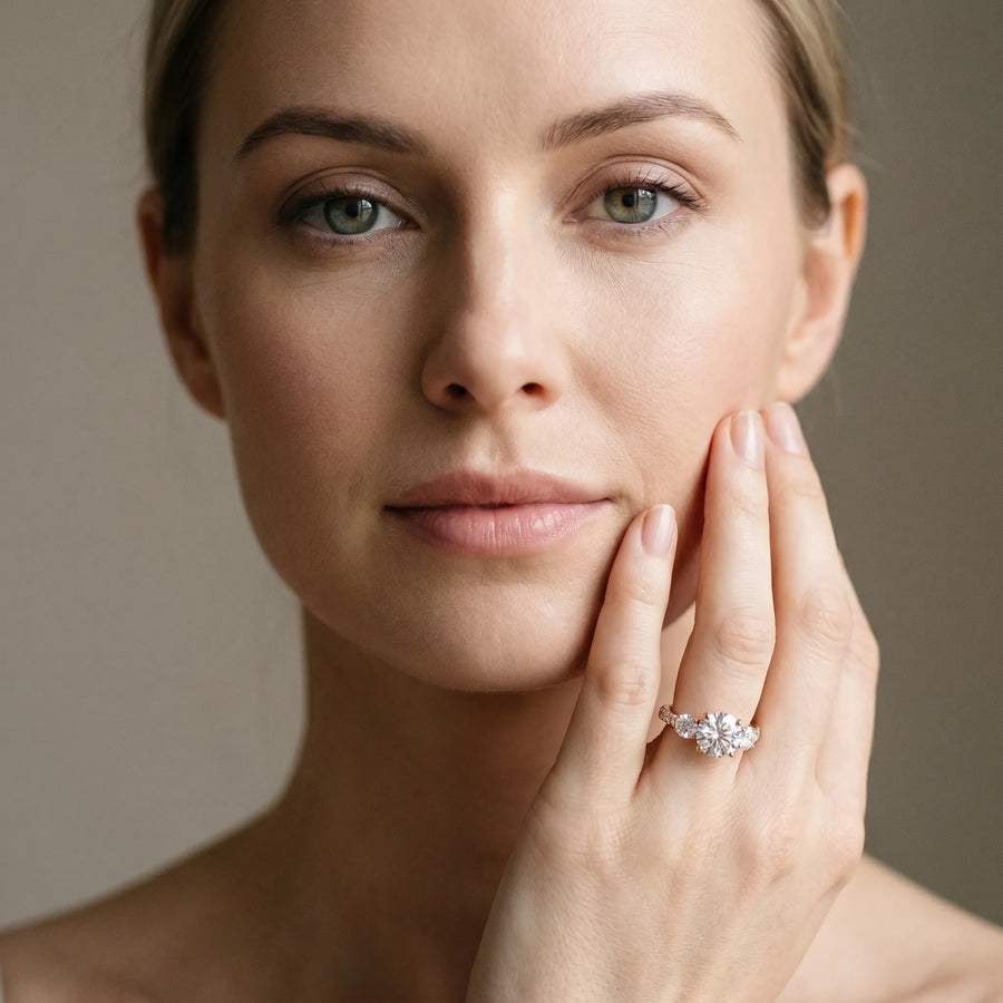 Rose gold Round Cut Diamond Three-Stone Ring with Round Side Stones and Pavé Band