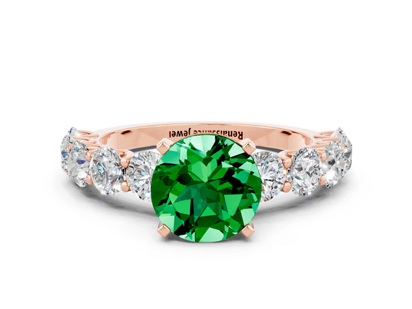 Rose gold Round Cut Emerald Prong Setting with Side Stones on a Pave Band