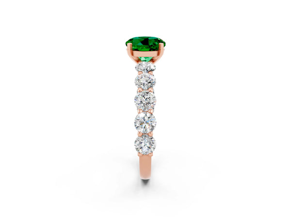 Rose gold Round Cut Emerald Prong Setting with Side Stones on a Pave Band