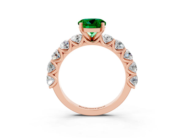 Rose gold Round Cut Emerald Prong Setting with Side Stones on a Pave Band