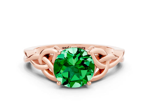 Rose gold Round Cut Emerald Solitaire Engagement Ring with Celtic Knot Band and Four-Prong Setting